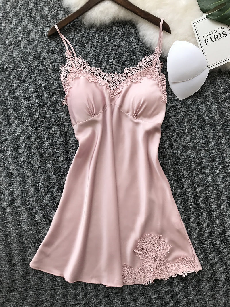 Sleeveless nightdress with lace detailing around the neckline and hem, displayed on a wooden hanger against a gray background—sexy, elegant, and perfect for homewear.