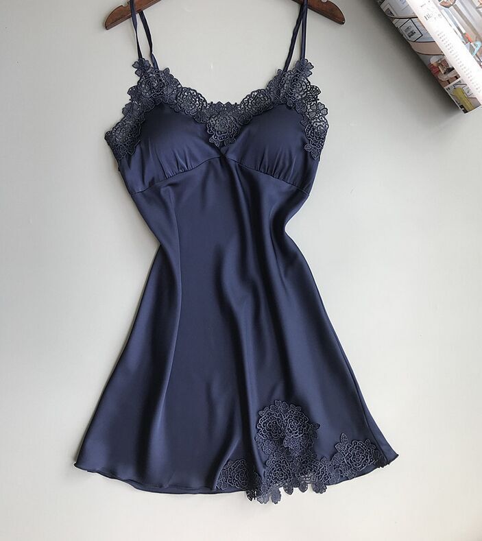 Sleeveless nightdress with lace detailing around the neckline and hem, displayed on a wooden hanger against a gray background—sexy, elegant, and perfect for homewear.