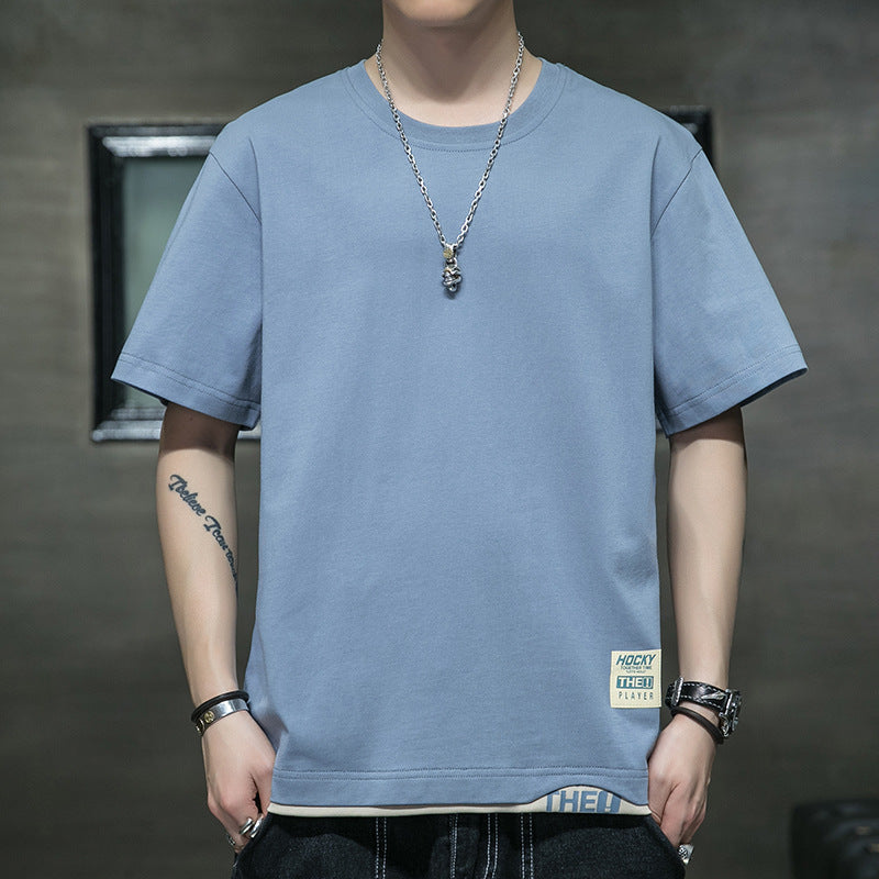 Graphic streetwear t-shirt available in multiple colors – featuring an abstract line design, text elements, soft breathable fabric, and stylish modern appeal.