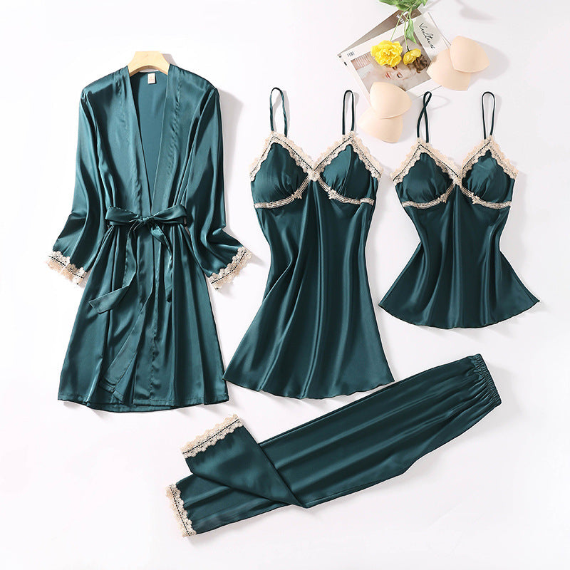 Teal silk sleepwear set featuring a robe, nightgown, camisole, and long pants with delicate white lace trim—luxurious, soft, and perfect for sleep and lounge.