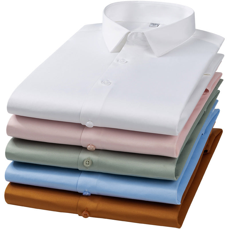 Premium stretch silk men’s long-sleeve button-up shirt in a solid white color, worn by a seated individual, showcasing smooth luxurious fabric and business-ready styling.