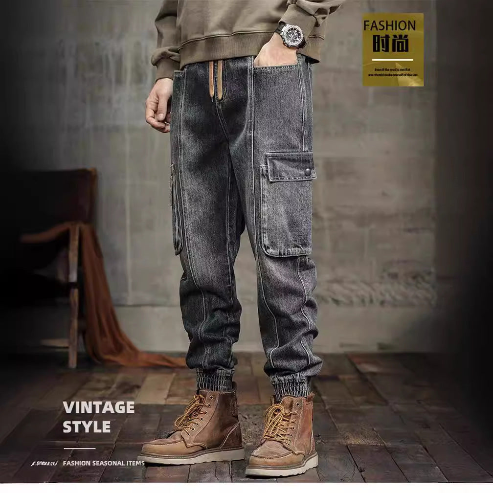 Vintage cargo jeans with drawstring waist, multiple pockets, and brown boots, styled with a sweatshirt in a modern setting
