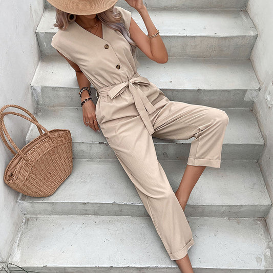 Stylish summer jumpsuit with short sleeves, V-neckline, three-button front, and waist belt – elegant, breathable, and perfect for casual or chic wear.