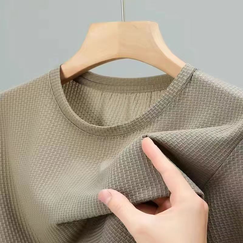 Premium shirt or t-shirt available in black, white, blue, khaki, green, and more – featuring a textured woven pattern, soft breathable fabric, and refined craftsmanship for stylish everyday wear.