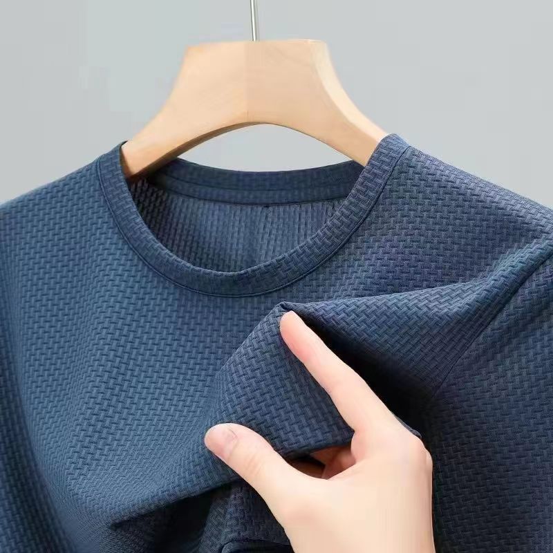 Premium shirt or t-shirt available in black, white, blue, khaki, green, and more – featuring a textured woven pattern, soft breathable fabric, and refined craftsmanship for stylish everyday wear.