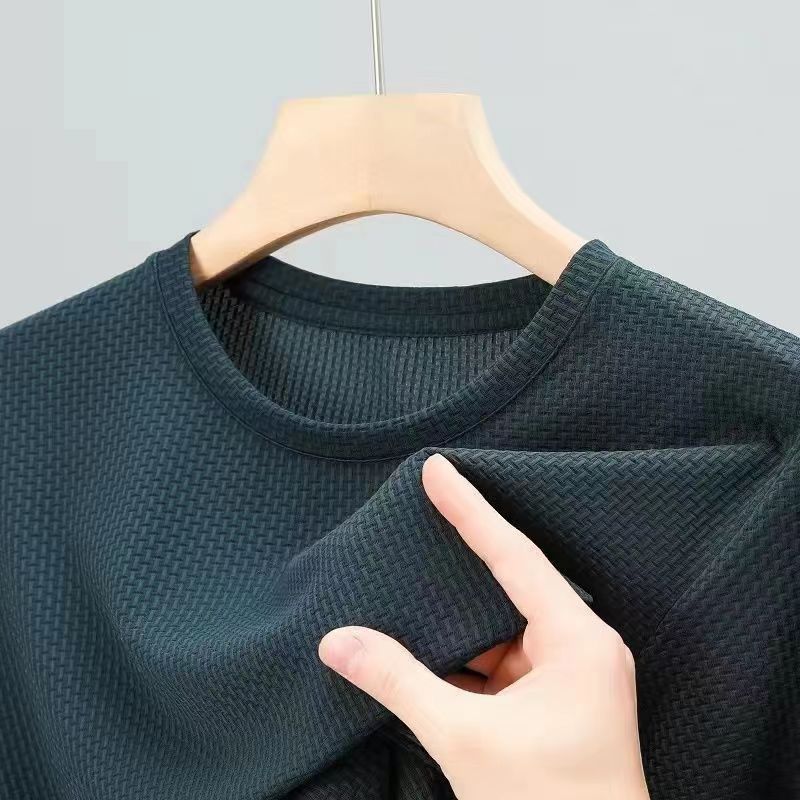 Premium shirt or t-shirt available in black, white, blue, khaki, green, and more – featuring a textured woven pattern, soft breathable fabric, and refined craftsmanship for stylish everyday wear.