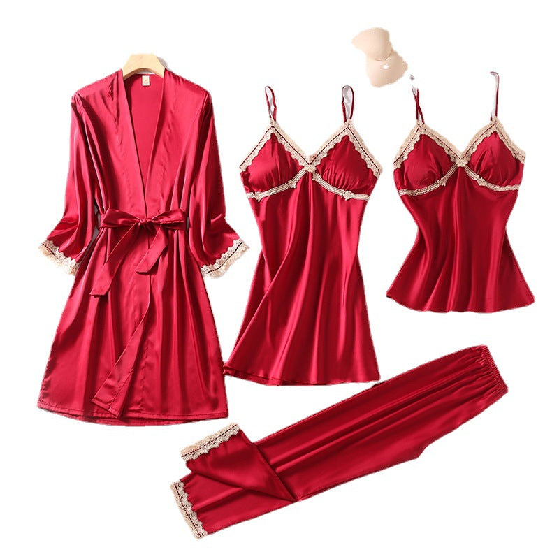 Teal silk sleepwear set featuring a robe, nightgown, camisole, and long pants with delicate white lace trim—luxurious, soft, and perfect for sleep and lounge.