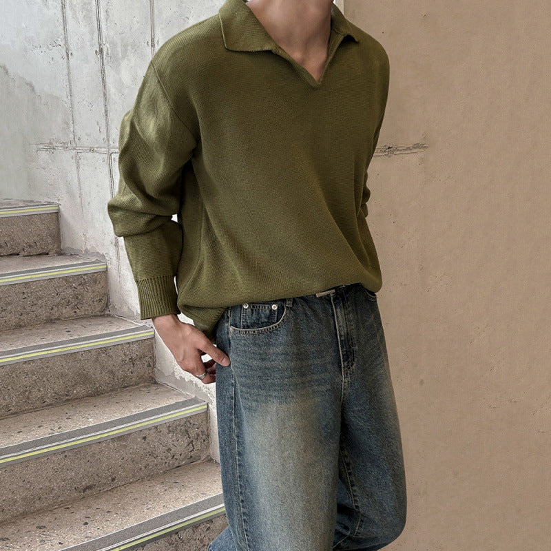 Green long-sleeve knitted sweater featuring a structured V-neck collar, ribbed cuffs, and hem, laid flat against a white background—classic, versatile, and perfect for layering.