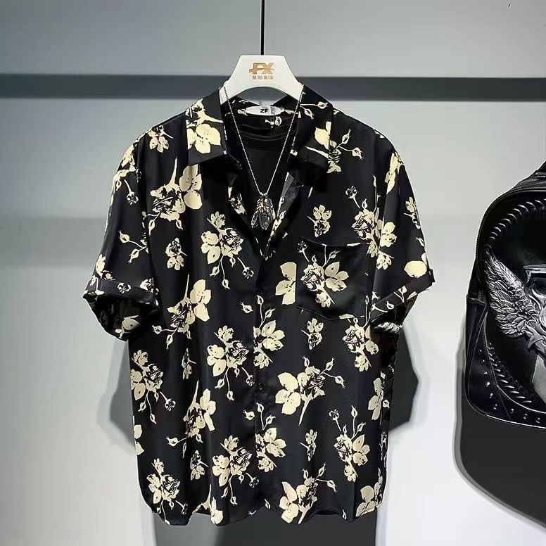 Stylish floral short-sleeve shirt available in black and army green – featuring a bold beige floral print, soft breathable fabric, and effortless styling