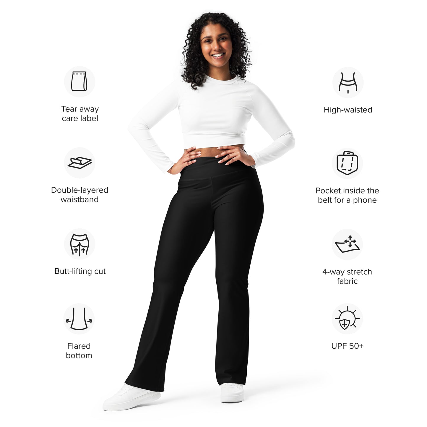 Person wearing black leggings paired with a beige crop top, white button-up jacket, and white sneakers—modern, stylish, and perfect for casual fashion.