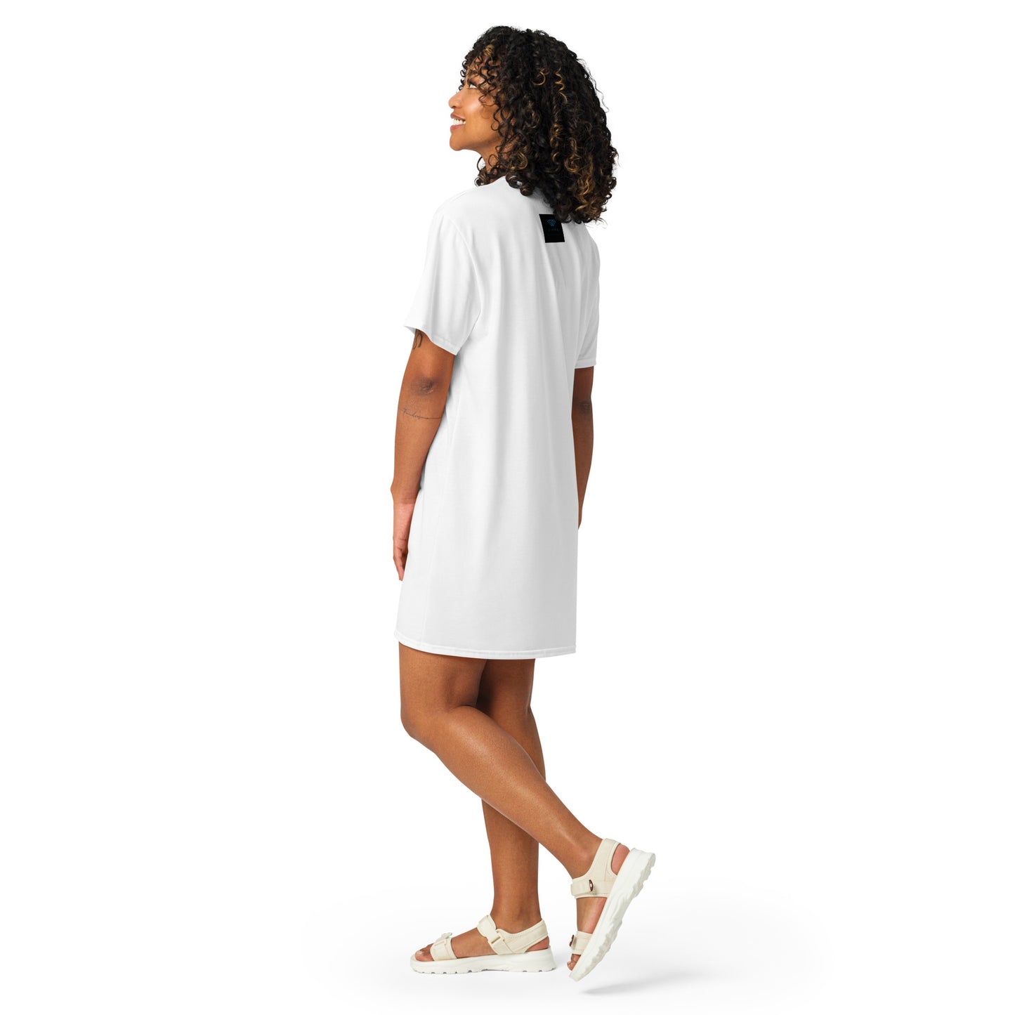 White t-shirt dress featuring a bold graphic design with sunglasses, a pink polka-dot headscarf, red lips, and a wine-pouring illustration—effortless, stylish, and perfect for confident fashion.