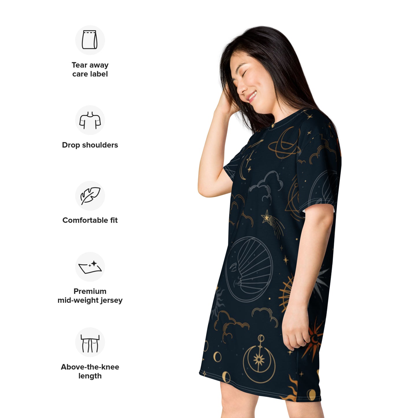 Person wearing a dark celestial-themed t-shirt dress featuring stars, moons, and planets, paired with sneakers—modern, artistic, and perfect for cosmic-inspired fashion.