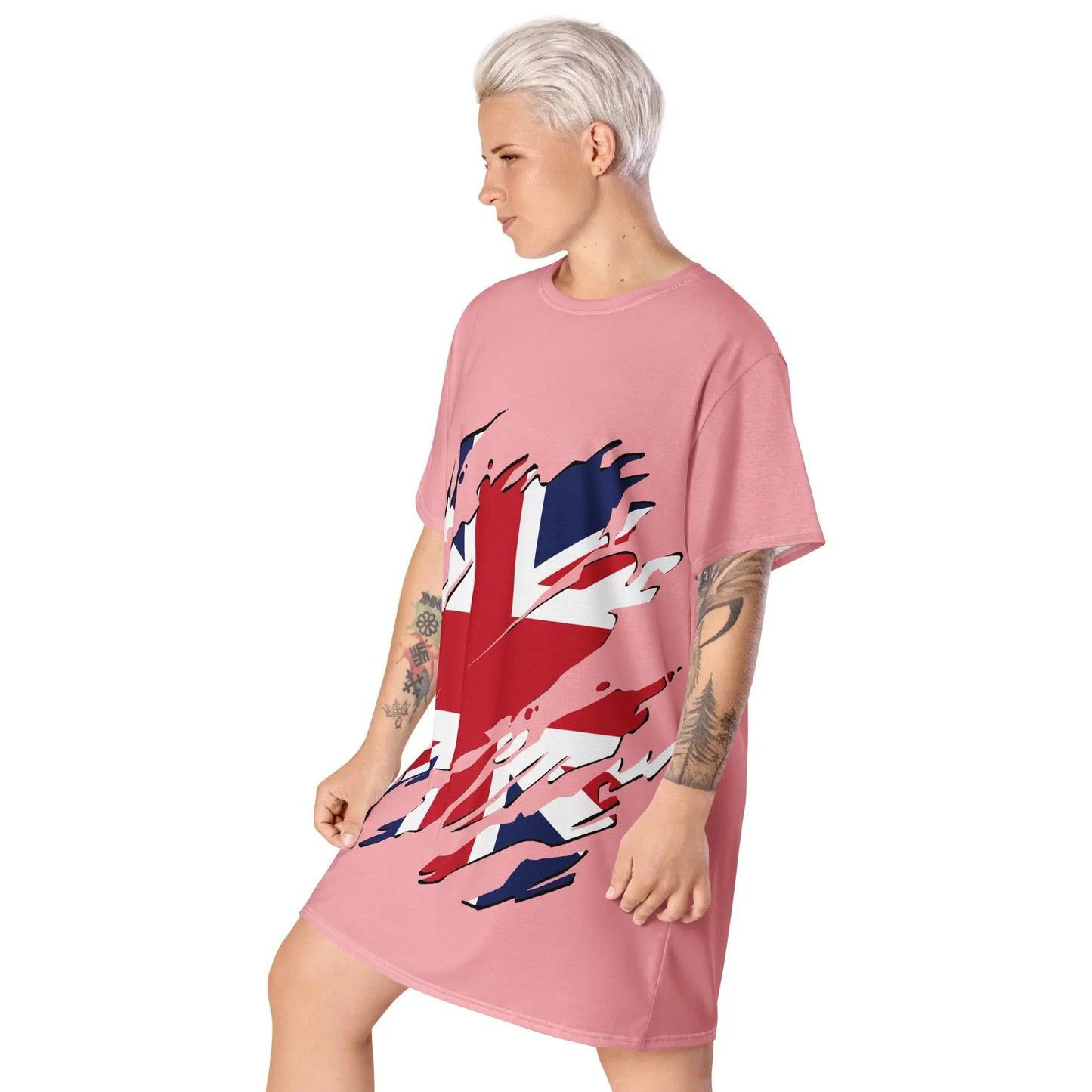 Pink oversized t-shirt dress featuring a distressed Union Jack graphic on the front, paired with black boots—stylish, edgy, and perfect for casual streetwear.