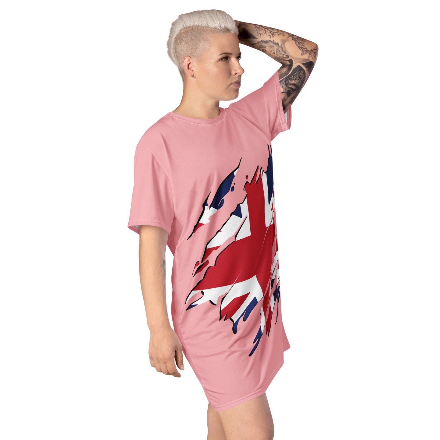 Pink oversized t-shirt dress featuring a distressed Union Jack graphic on the front, paired with black boots—stylish, edgy, and perfect for casual streetwear.