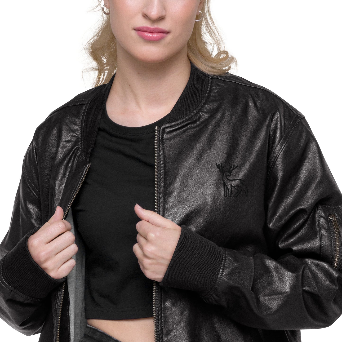 Black faux leather jacket with ribbed cuffs and hem, a zip-up front, soft grey inner lining, and a small embroidered deer logo on the chest—stylish, structured, and perfect for casual or dressy outfits.