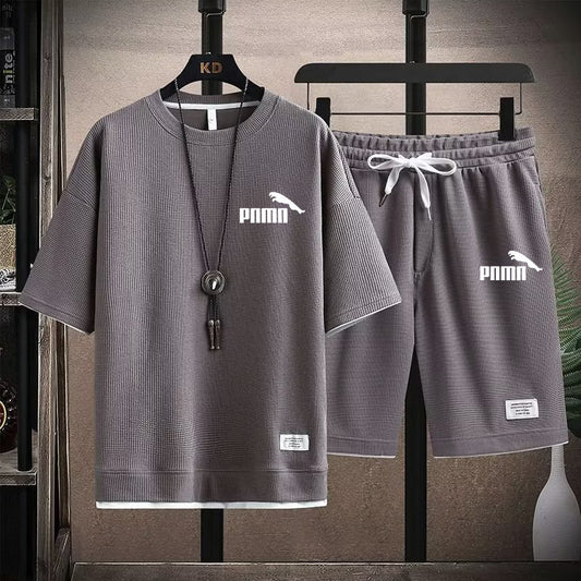 Grey breathable fabric with textured grid-like weave, showcasing quick-drying technology and eco-friendly production—perfect for activewear and performance clothing.