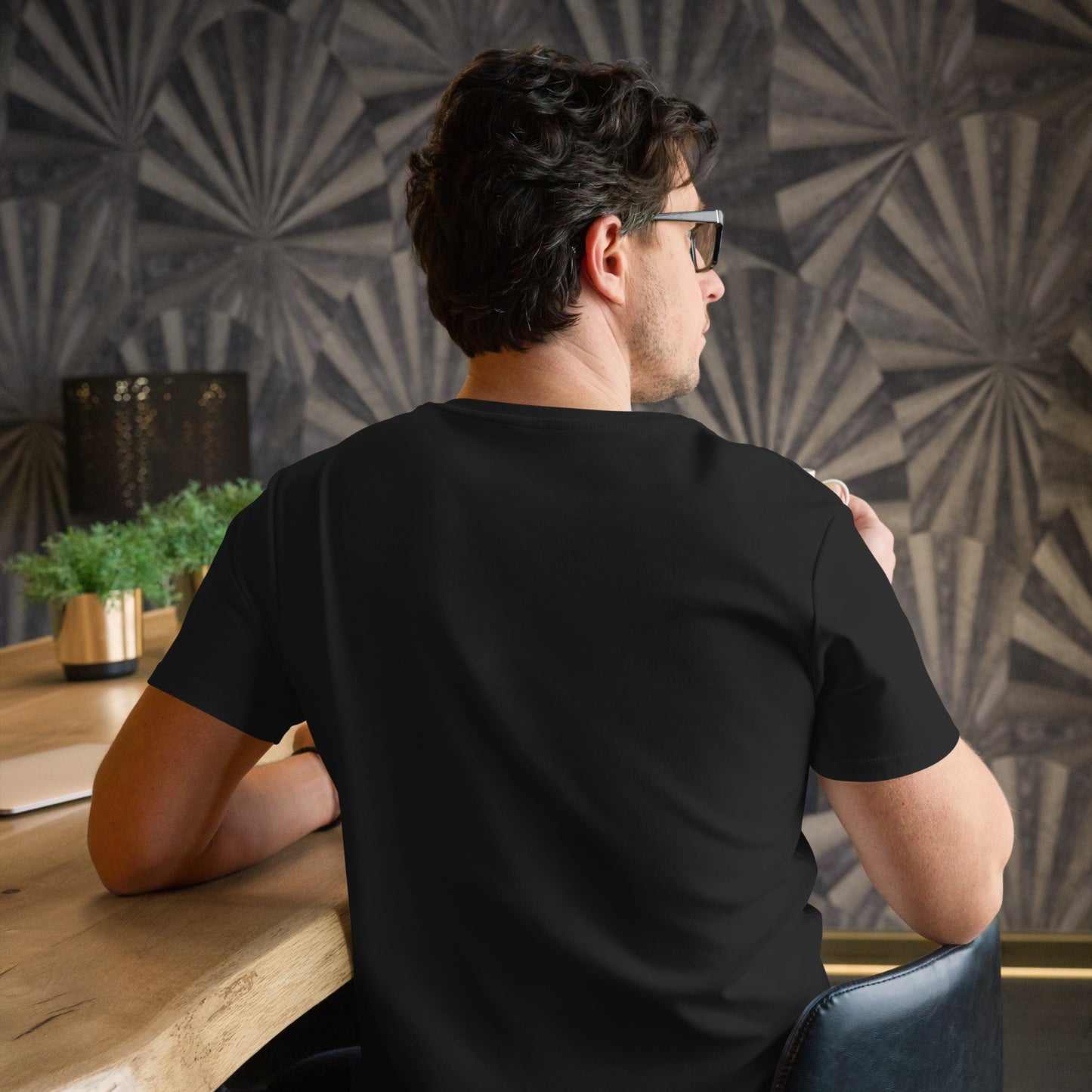 Black t-shirt featuring a small white cursor arrow graphic on the left side of the chest—minimalist, stylish, and perfect for casual wear.