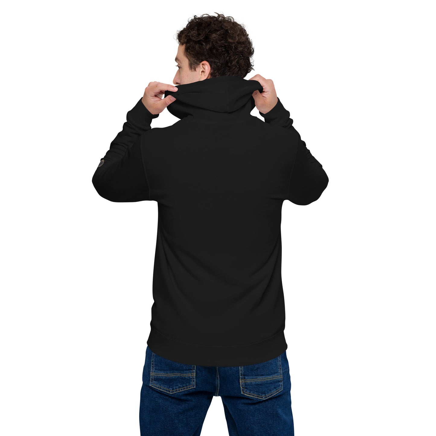 Person wearing a black zip-up hoodie featuring brushed fleece inside, kangaroo pockets, and a hood with matching drawstrings, paired with blue jeans—modern, comfortable, and perfect for athleisure styling.