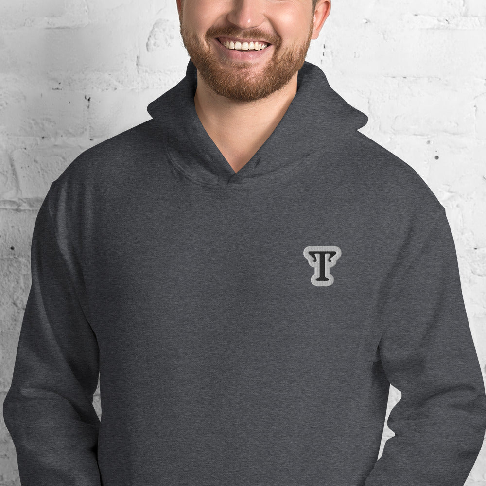 deep grey hoodie featuring an embroidered letter ‘T’ on the left chest, worn against a white brick wall—modern, stylish, and available in black, navy, and Red.