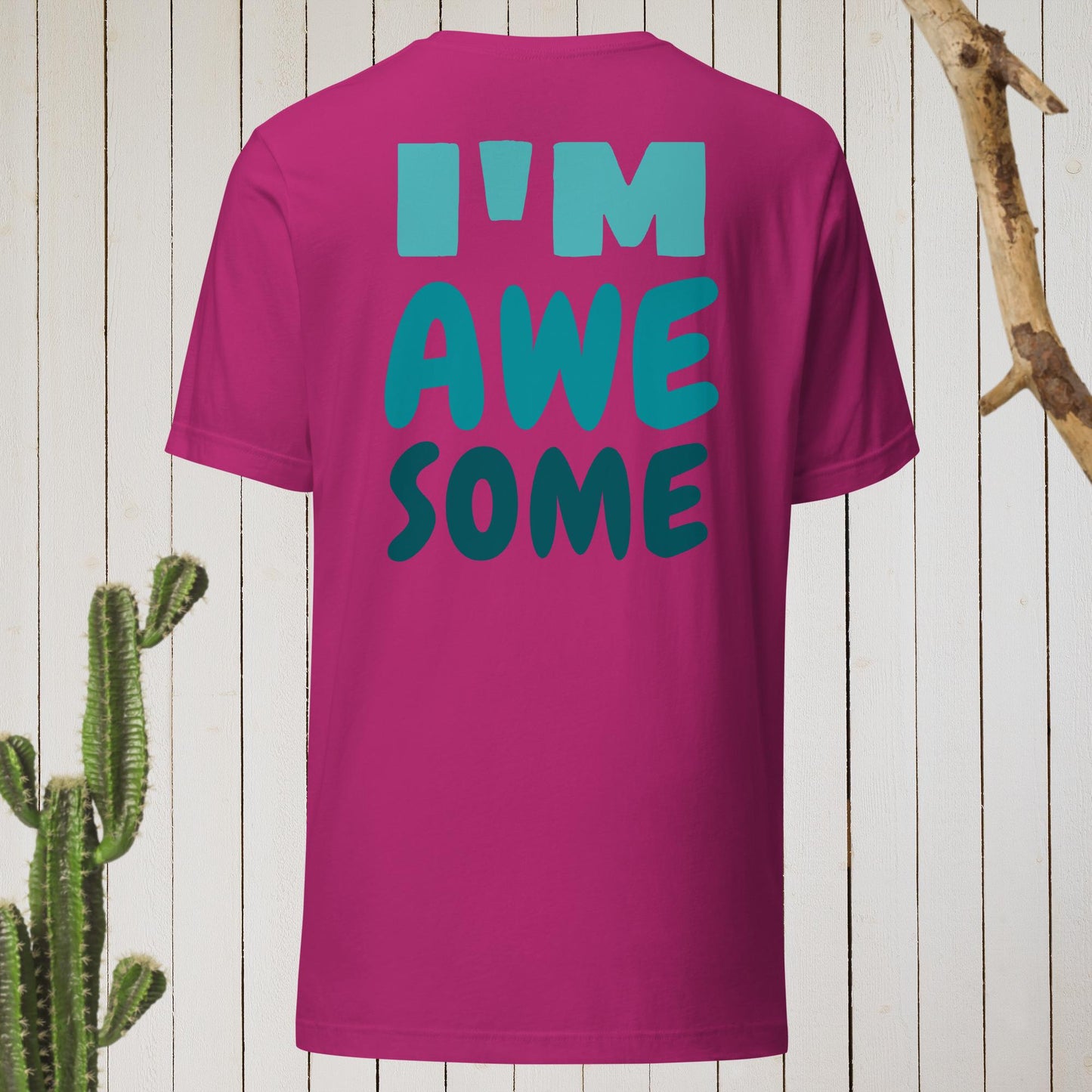 Dark gray t-shirt featuring a geometric bird design with a red head and teal-green body on the front, and bold blue text reading ‘I’M AWESOME’ on the back—stylish, artistic, and perfect for casual wear.