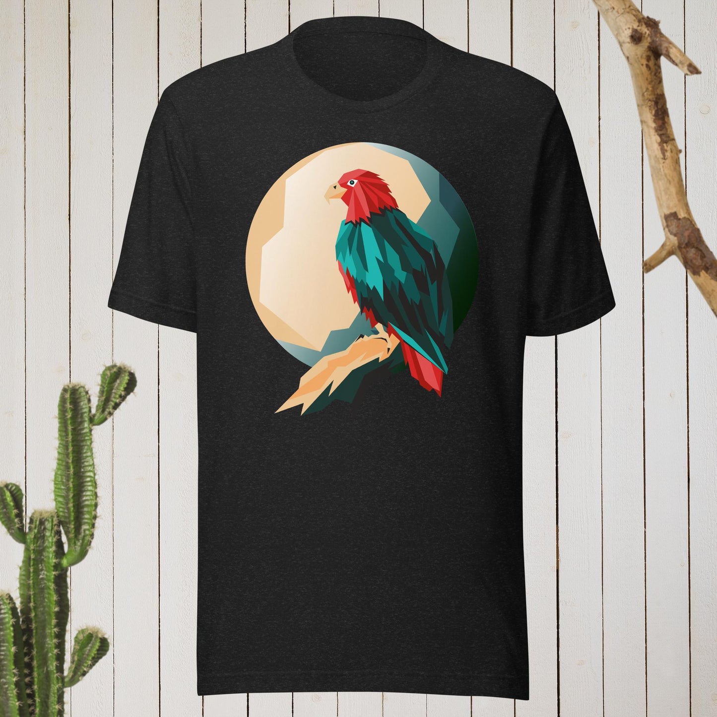Dark gray t-shirt featuring a geometric bird design with a red head and teal-green body on the front, and bold blue text reading ‘I’M AWESOME’ on the back—stylish, artistic, and perfect for casual wear.
