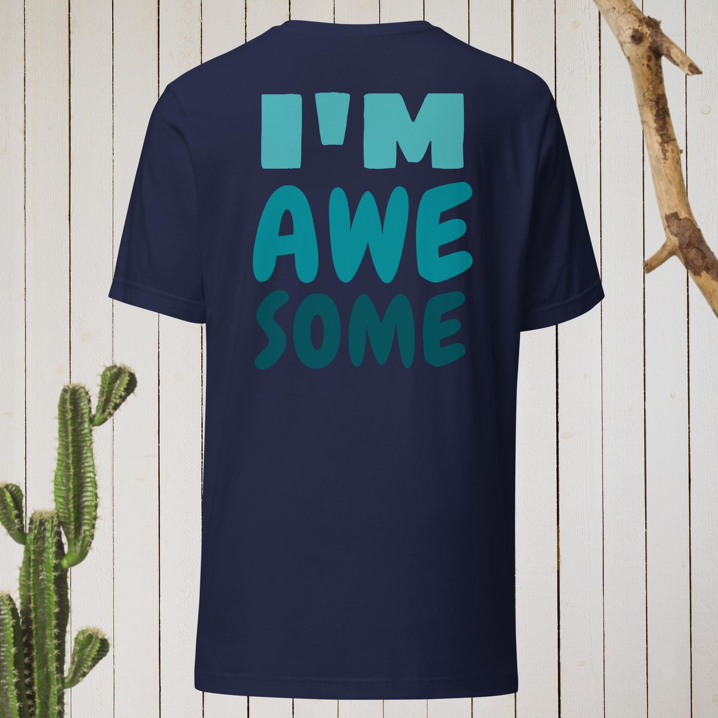Navy t-shirt featuring a geometric bird design with a red head and teal-green body on the front, and bold blue text reading ‘I’M AWESOME’ on the back—stylish, artistic, and perfect for casual wear.