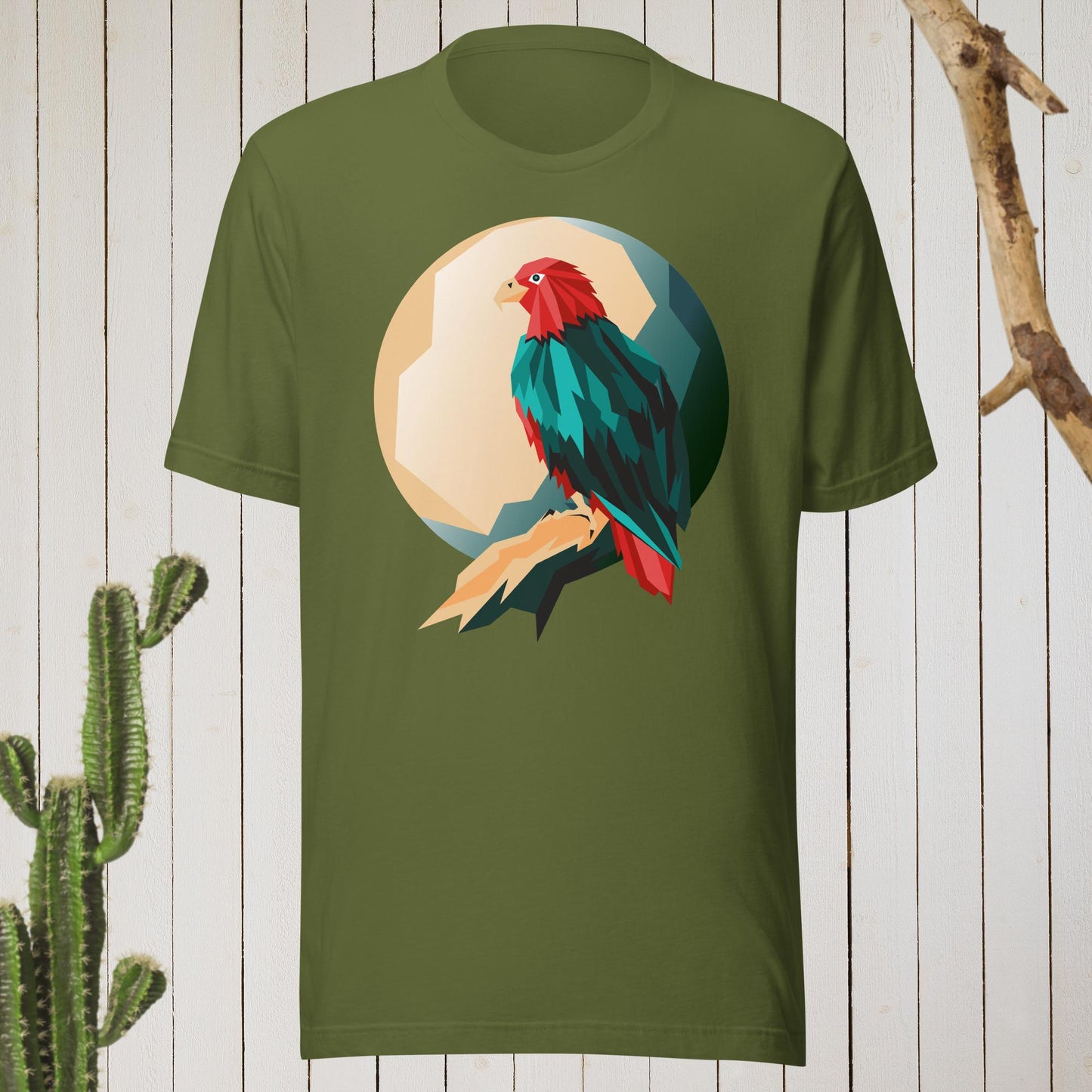 Military green t-shirt featuring a geometric bird design with a red head and teal-green body on the front, and bold blue text reading ‘I’M AWESOME’ on the back—stylish, artistic, and perfect for casual wear.