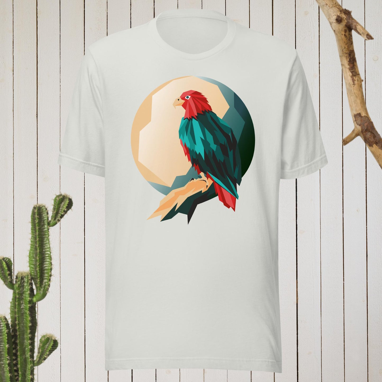 White t-shirt featuring a geometric bird design with a red head and teal-green body on the front, and bold blue text reading ‘I’M AWESOME’ on the back—stylish, artistic, and perfect for casual wear.