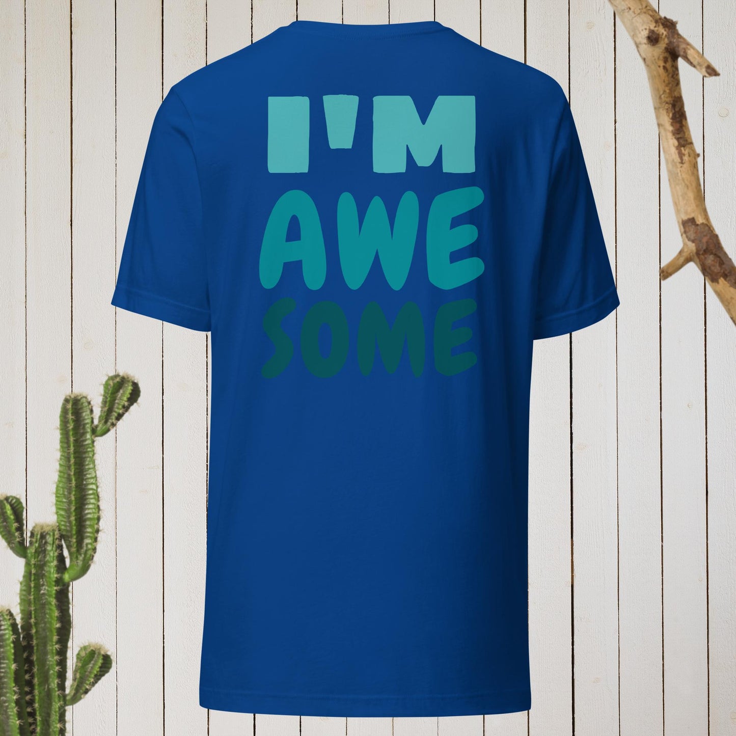 Royal blue t-shirt featuring a geometric bird design with a red head and teal-green body on the front, and bold blue text reading ‘I’M AWESOME’ on the back—stylish, artistic, and perfect for casual wear.