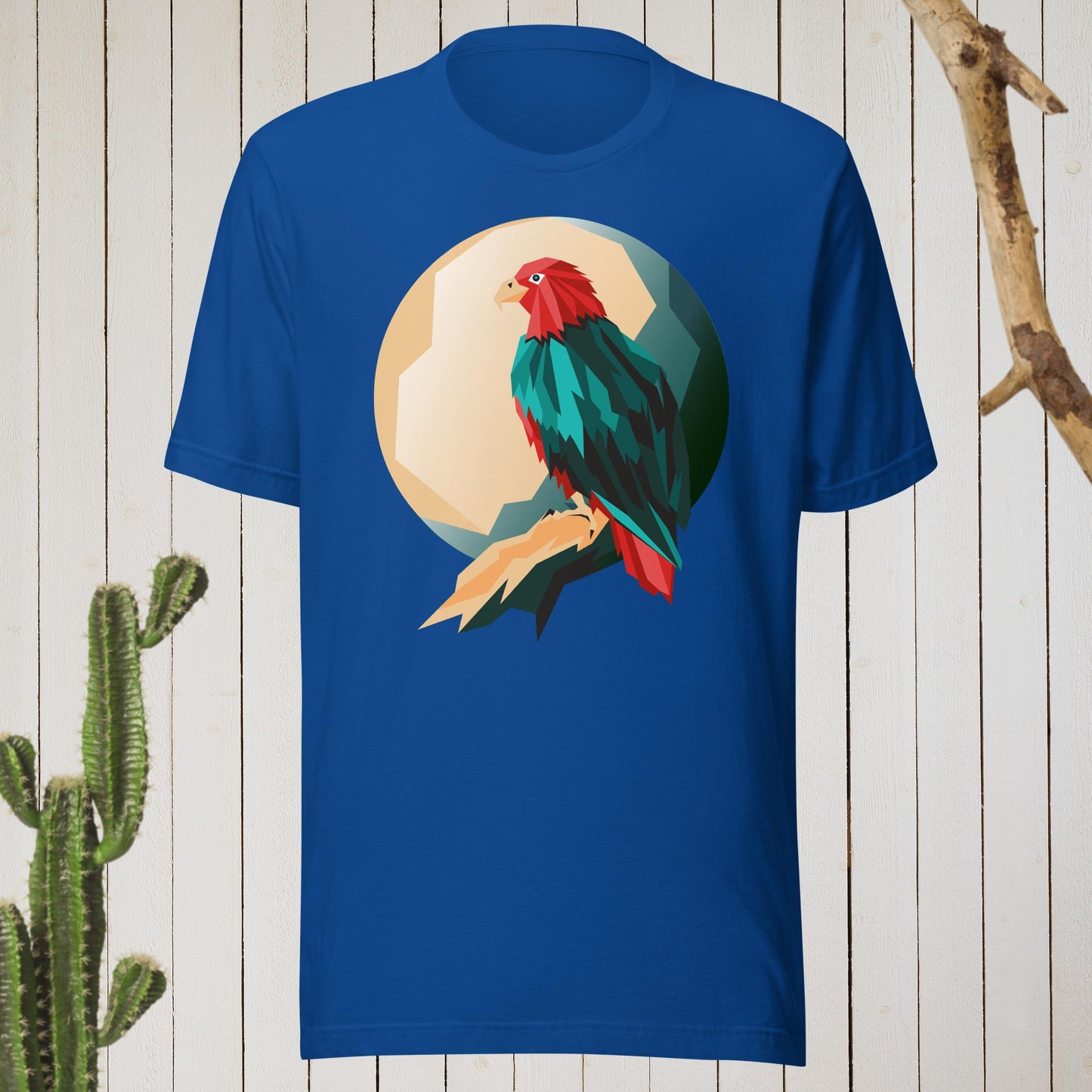 Royal blue t-shirt featuring a geometric bird design with a red head and teal-green body on the front, and bold blue text reading ‘I’M AWESOME’ on the back—stylish, artistic, and perfect for casual wear.
