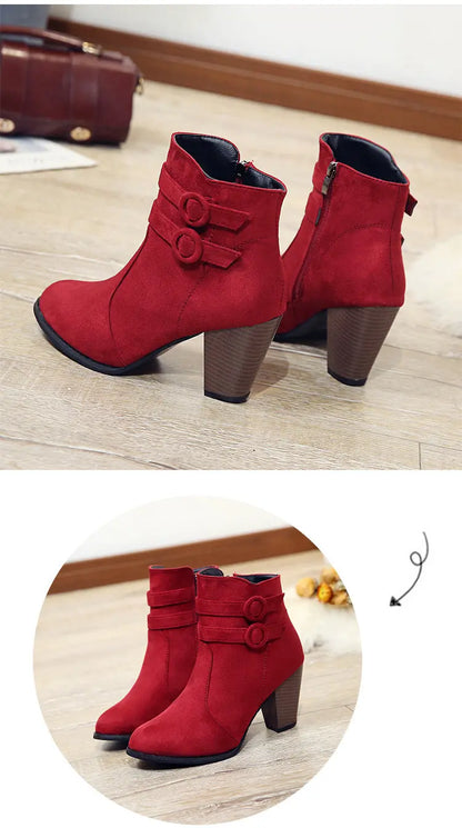 Red suede ankle boots with a chunky brown block heel and double buckle strap detail on the side, shown in a two-panel layout with a larger floor view and a circular inset close-up.