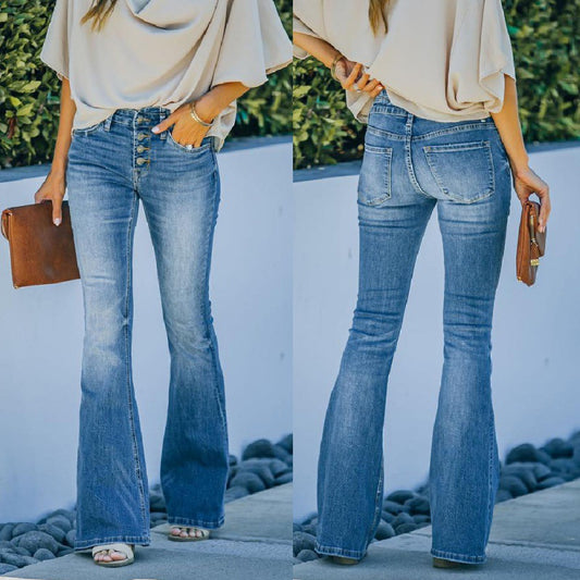 Woman wearing high-waist flared jeans with a button-front detail, styled with a light-colored blouse and brown clutch—elegant, flattering, and perfect for casual or dressy outfits.