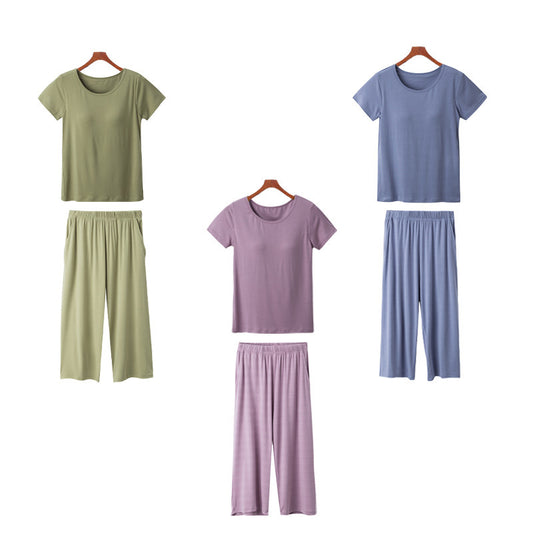 Ladies’ charmodal short-sleeve pajama set with cropped pants, featuring built-in bra pads and solid color options, made from lightweight, breathable fabric—comfortable, stylish, and perfect for homewear.