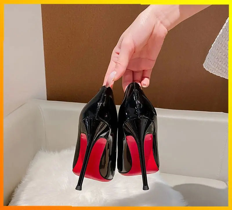 A bold, high-shine heel designed to command attention with timeless elegance.