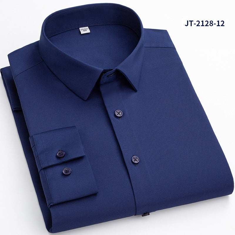 Premium stretch silk men’s long-sleeve button-up shirt in a solid white color, worn by a seated individual, showcasing smooth luxurious fabric and business-ready styling.