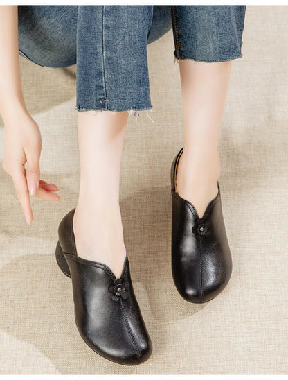 A person wearing black loafers with blue jeans, while the bottom panel shows a pair of black loafers next to a pair of brown loafers on a light beige floor.