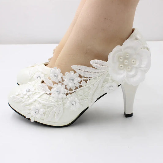 Romantic floral lace heels crafted to order for your special day.