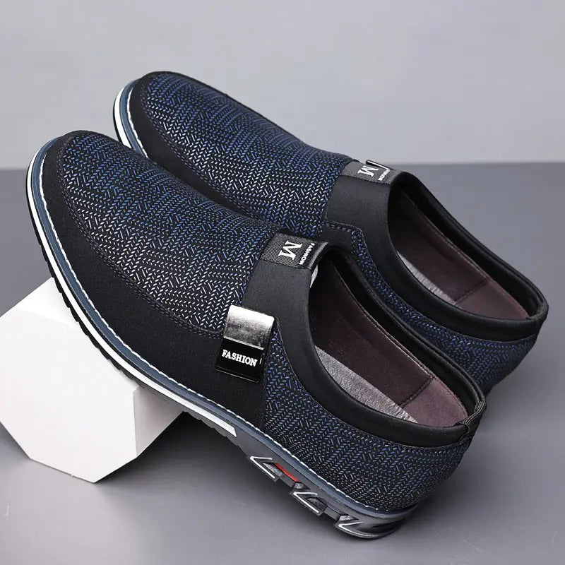 Men’s black slip-on casual loafers with breathable upper and cushioned sole