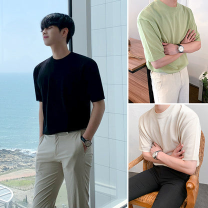 A men's ribbed knit t-shirt in black green and beige, featuring a sleek textured fabric and a modern fit, ideal for versatile outfits.