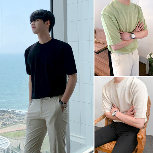 A men's ribbed knit t-shirt in black green and beige, featuring a sleek textured fabric and a modern fit, ideal for versatile outfits.