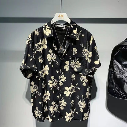 Stylish floral short-sleeve shirt available in black and army green – featuring a bold beige floral print, soft breathable fabric, and effortless styling