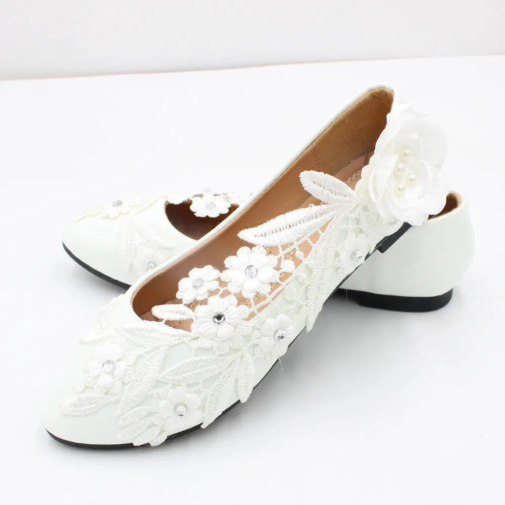 Romantic floral lace heels crafted to order for your special day.