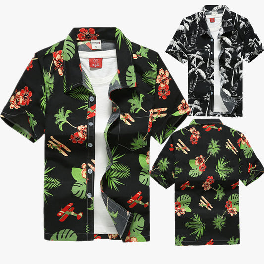 Tropical button-up shirt featuring a black base with green palm leaves, red hibiscus flowers, and airplane motifs, displayed flat to showcase summer-ready, relaxed styling.