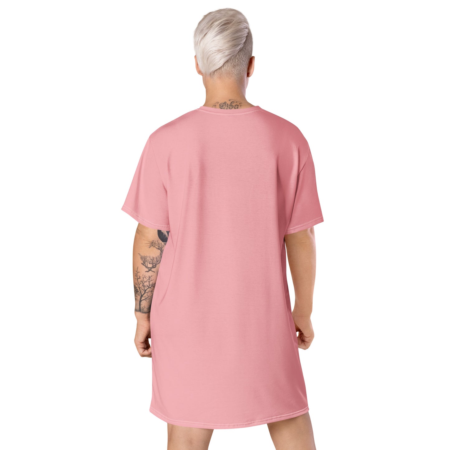 Pink oversized t-shirt dress featuring a distressed Union Jack graphic on the front, paired with black boots—stylish, edgy, and perfect for casual streetwear.