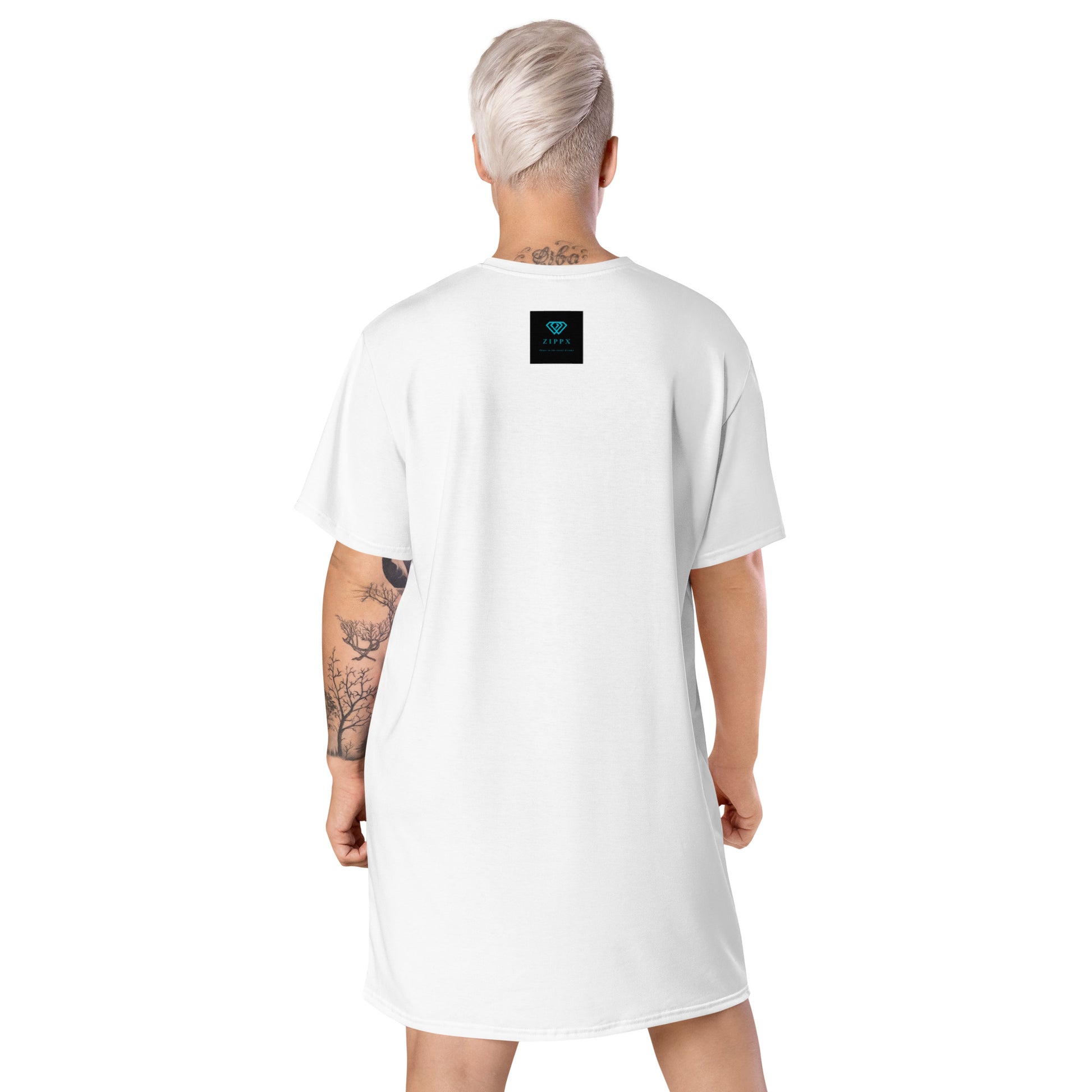 White t-shirt dress featuring a bold graphic design with sunglasses, a pink polka-dot headscarf, red lips, and a wine-pouring illustration—effortless, stylish, and perfect for confident fashion.