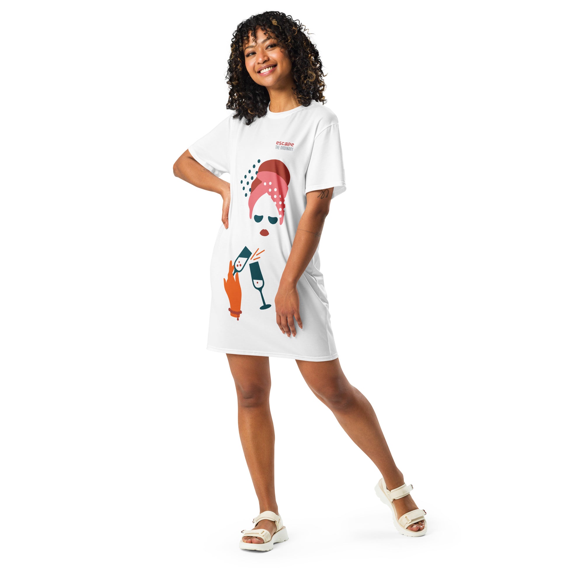 White t-shirt dress featuring a bold graphic design with sunglasses, a pink polka-dot headscarf, red lips, and a wine-pouring illustration—effortless, stylish, and perfect for confident fashion.