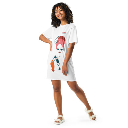 White t-shirt dress featuring a bold graphic design with sunglasses, a pink polka-dot headscarf, red lips, and a wine-pouring illustration—effortless, stylish, and perfect for confident fashion.