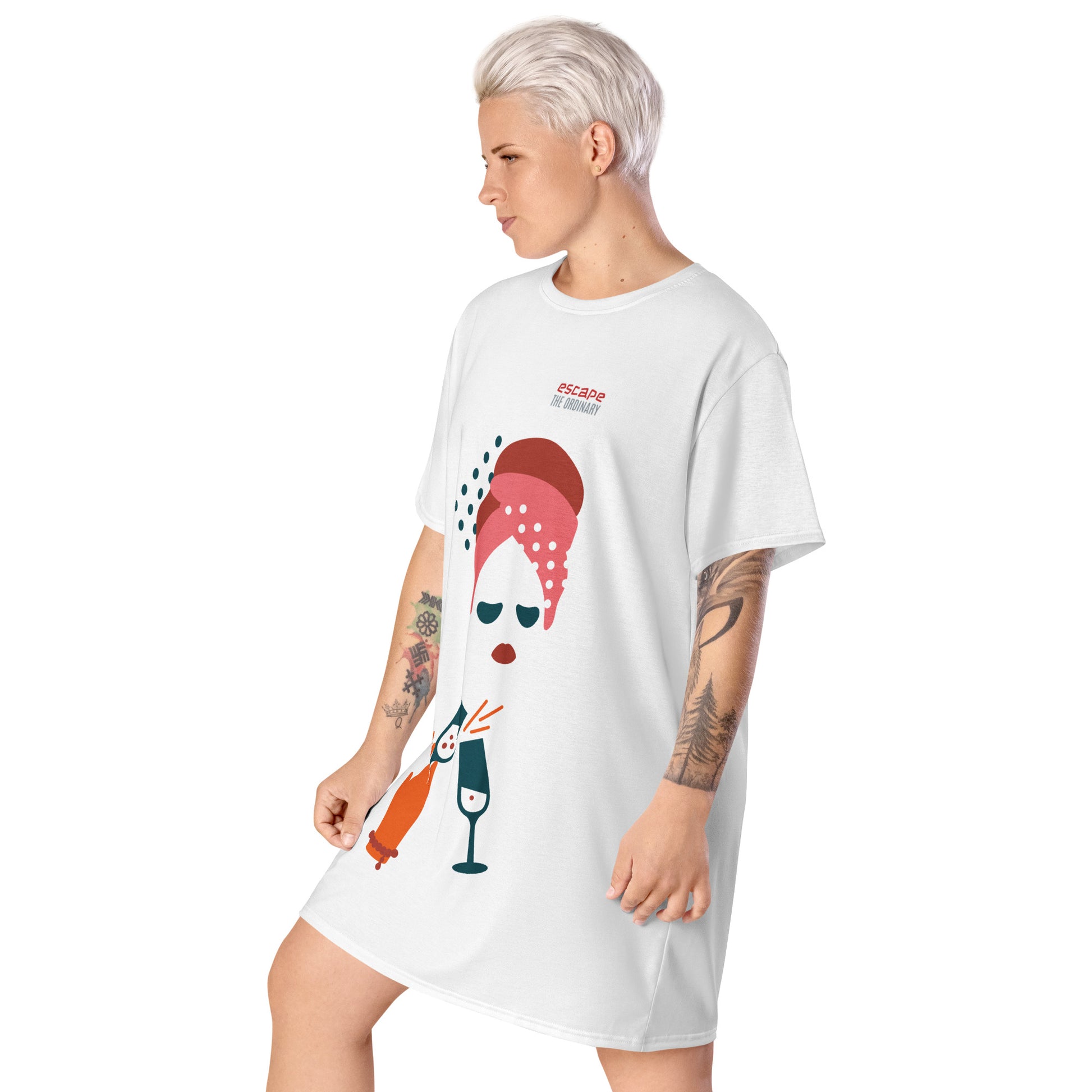 White t-shirt dress featuring a bold graphic design with sunglasses, a pink polka-dot headscarf, red lips, and a wine-pouring illustration—effortless, stylish, and perfect for confident fashion.