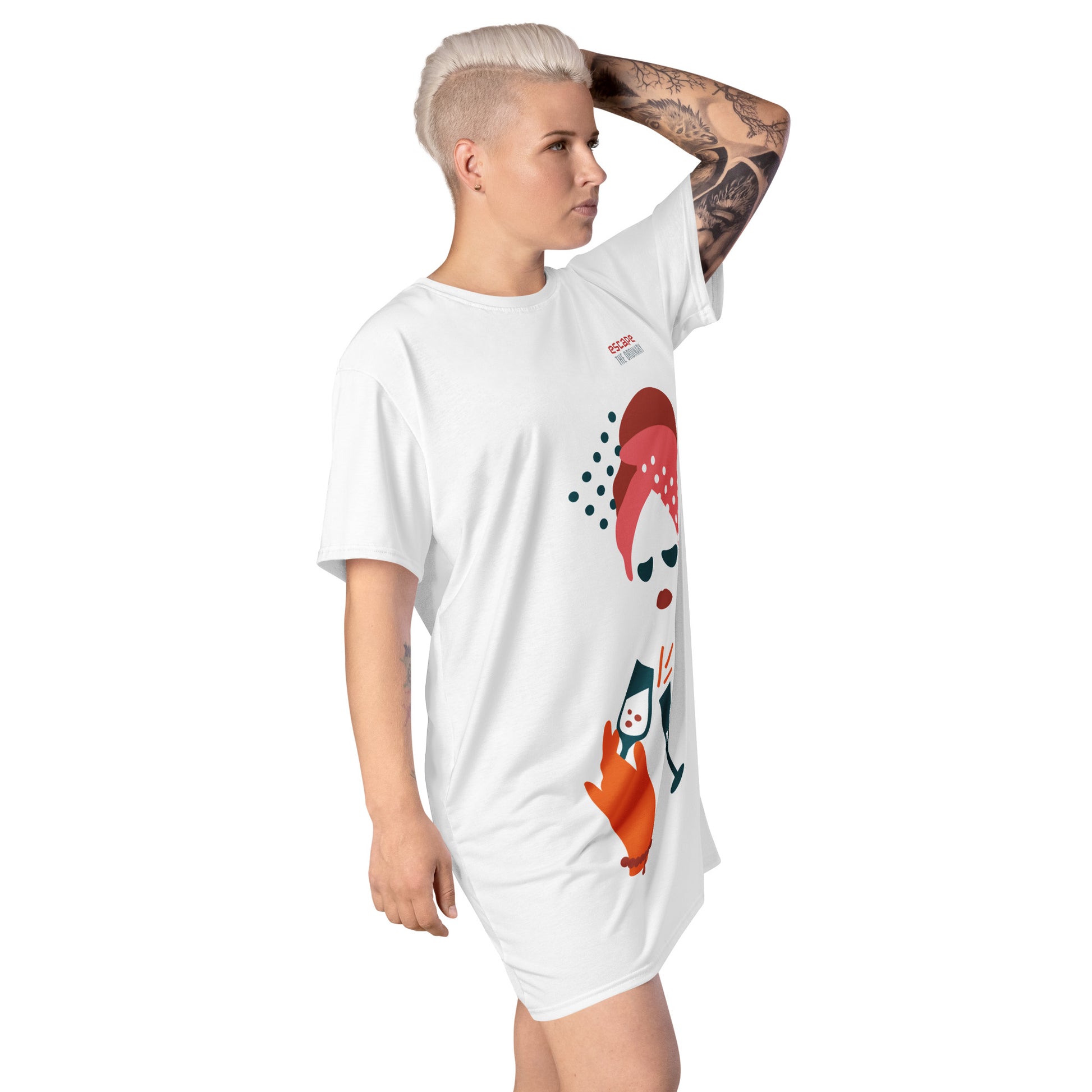 White t-shirt dress featuring a bold graphic design with sunglasses, a pink polka-dot headscarf, red lips, and a wine-pouring illustration—effortless, stylish, and perfect for confident fashion.