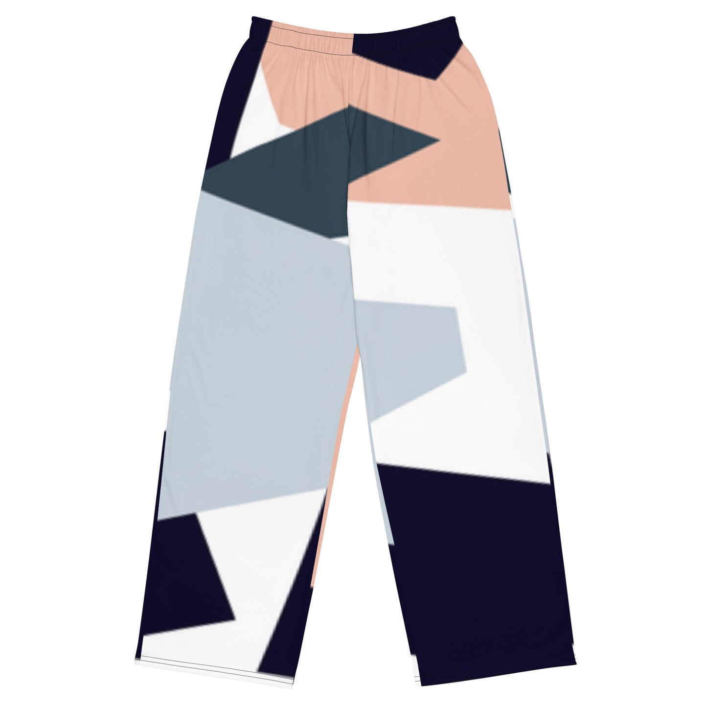 Woman wearing high-waist wide-leg pants with a geometric print in navy, light blue, pink, and white—styled with a beige long-sleeve shirt for an effortlessly chic look.